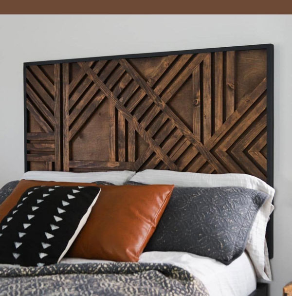 a bed with geometric-headboard