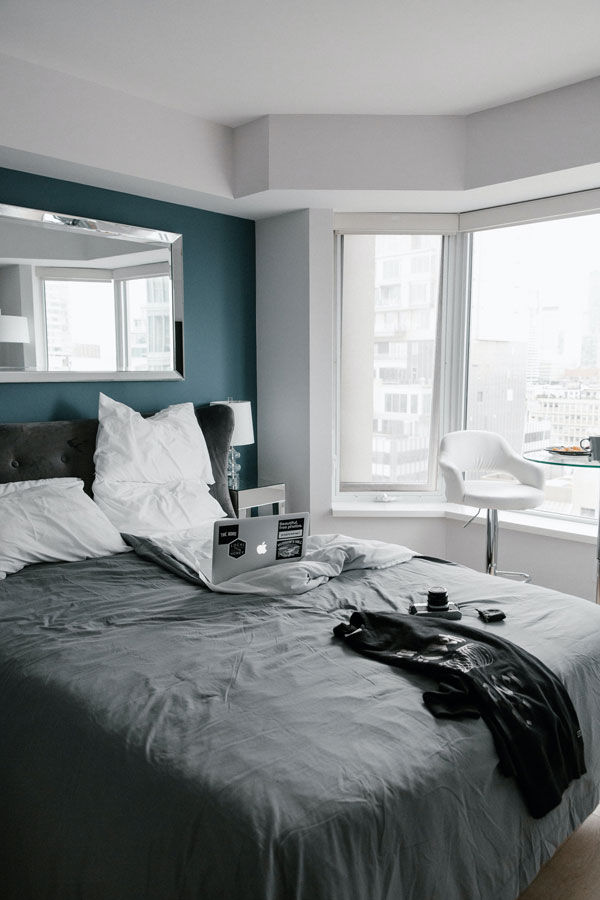 green and blue and gray bedroom