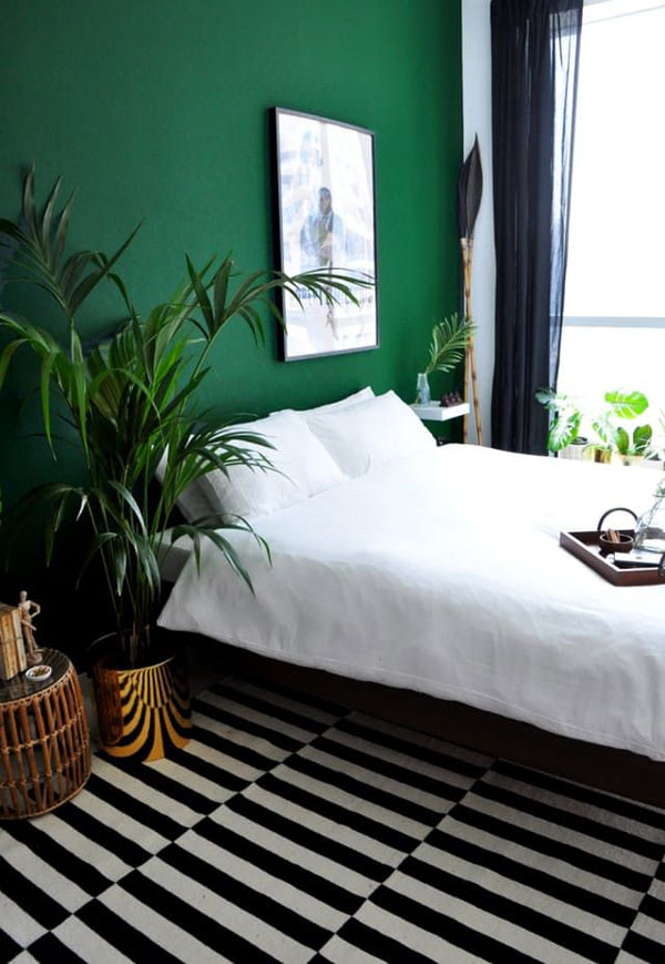 green-walls-and-black-bedroom