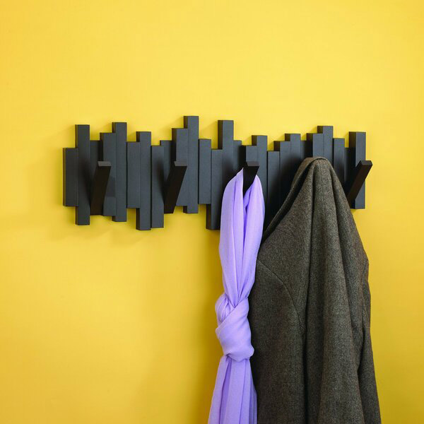 diy-coat-rack-on-yellow-wall